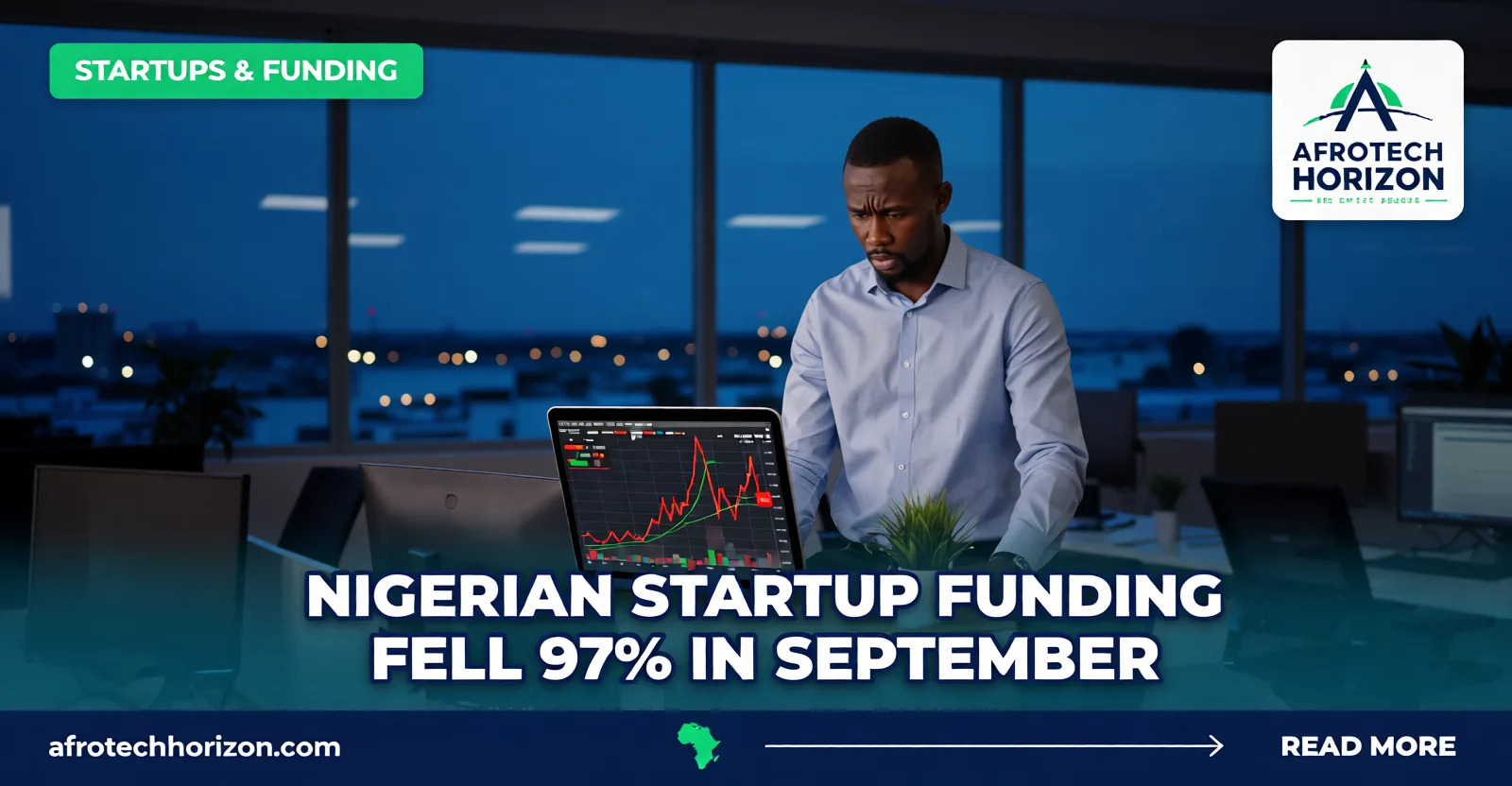 A founder sits alone in an evening co-working space, looking at a falling chart on his laptop.